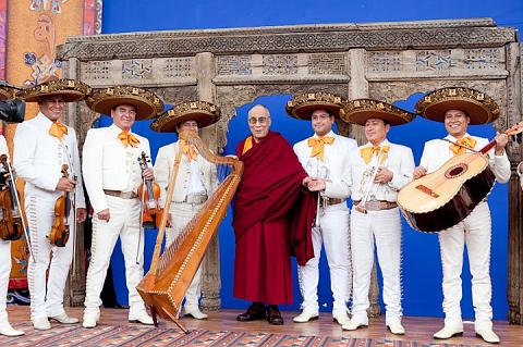 
Dalai Lama with some of the musicians who performed after his talk at the Cruz Azul Stadium in Mexico City on September 11, 2011
